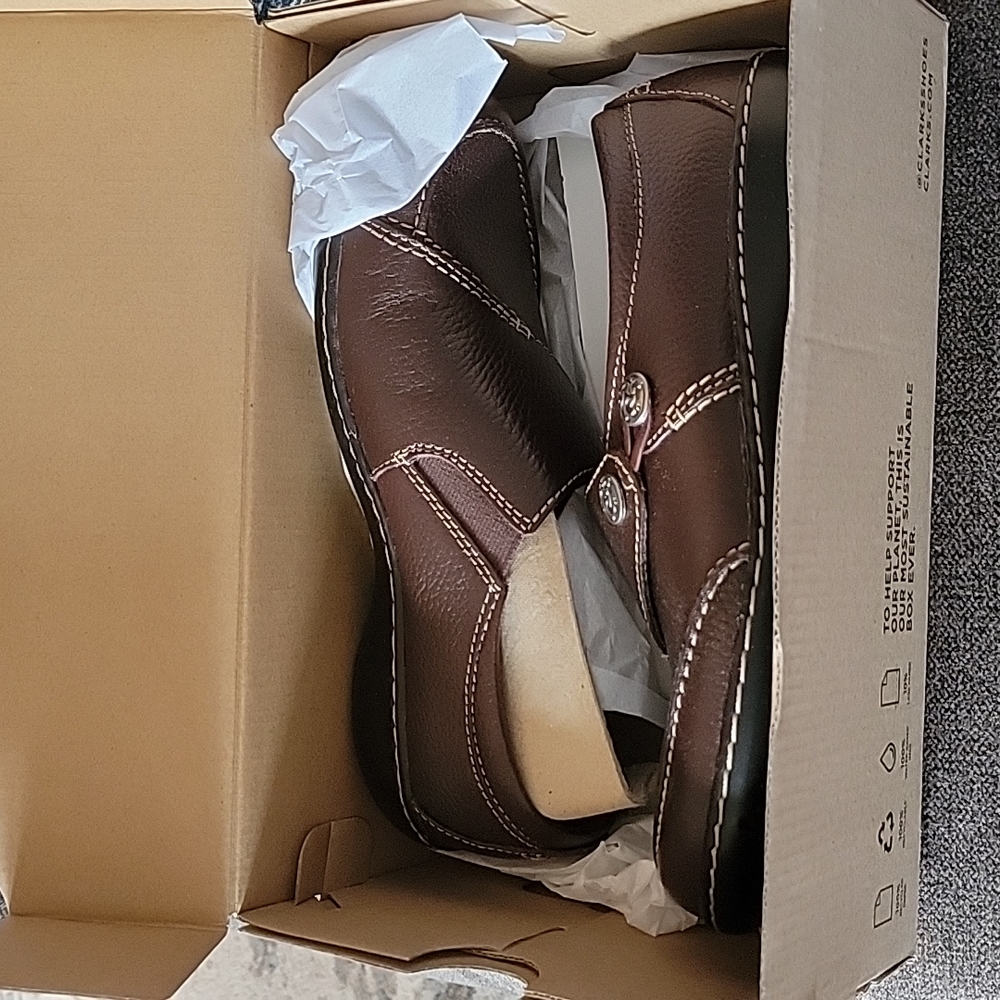 New in box Clarks.  Size 7.5. Brown.